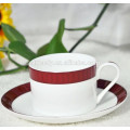 colored ceramic cup and saucer